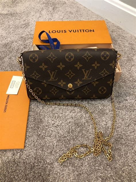 louis vuitton black bag with gold chain|louis vuitton chain wallet crossbody.